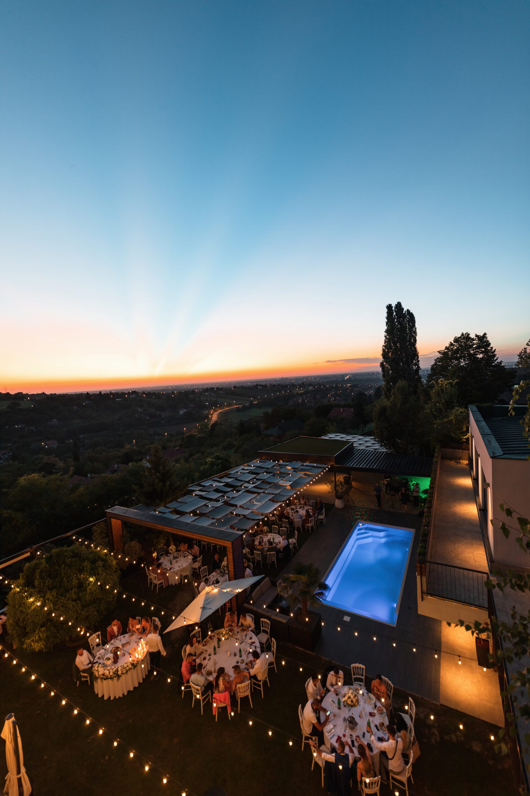 High angle view of wedding celebration at sunset. Copy space.